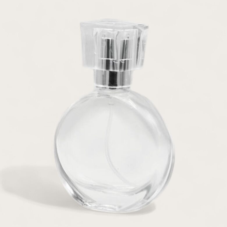 Stikla pudelīte ar zelta krāsas izsmidzinātāju un baltu vāciņu 50 ml